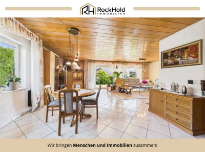 Ein- bis Zweifamilienhaus mit großzügigem Platzangebot und gepflegtem Garten in begehrter Lage