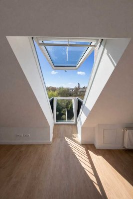 Stilvolle Maisonette-Dachgeschosswohnung in Wismar – Erstbezug nach Kernsanierung mit Garten