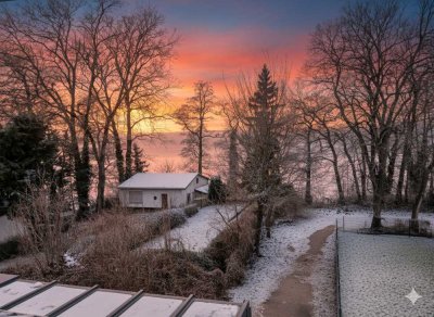 Haus am See: 3-Raum-Wohnung mit Seeblick und Wintergarten (OG)