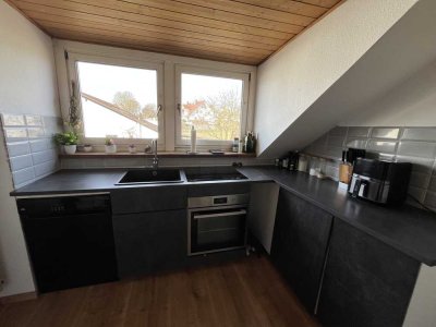 Schöne Dachgeschosswohnung in ruhiger Umgebung.