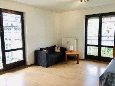 Möblierte 1-Zimmer-Wohnung mit Südbalkon und EBK im Glockenbachviertel