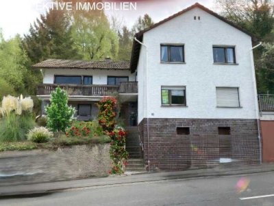Großzügiges Zweifamilienhaus mit Waldzugang und Südwest-Terrassen in idylischer Hanglage von Kimbach