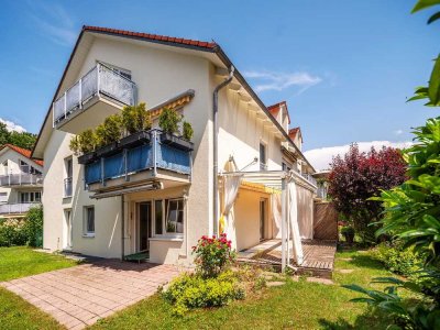 MAIER - Charmante  4- Zimmer-Gartenwohnung mit EBK, 2 TG-Einzelstellplätze zur Südwestseite