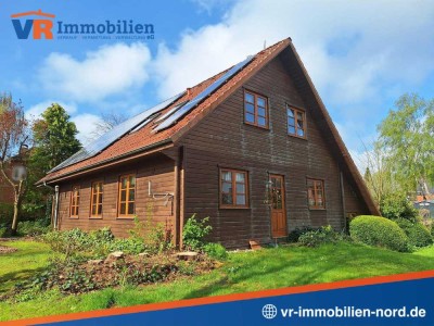 Zauberhaftes Holzbohlenhaus mit Einliegerwohnung in Mohrkirch