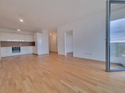 Neuwertige Balkonwohnung inkl. DAN-Küche mit Grünblick &amp; hohem Freizeitkomfort