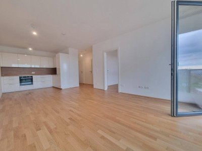 Neuwertige Wohnung mit Südbalkon, DAN-Küche und Freizeitangebot – Nähe U-Bahn