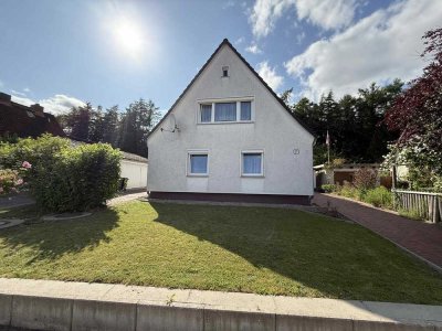 Familientraum mit viel Platz – Einfamilienhaus mit idyllischem Garten und Doppelgarage