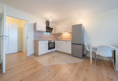 Attraktive 1-RW im Hochparterre* sonniger Balkon* EBK* Bad m. Dusche* TG-SP* grüne Wohnlage* zentral