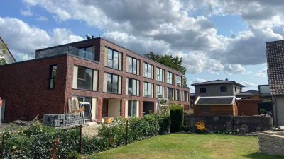 Neubau-Erstbezug in Fallersleben, lichtdurchflutete Reihenhauswohnung mit Garten