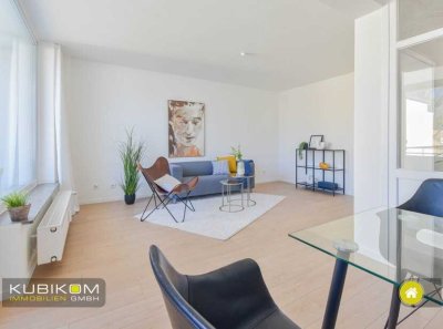 Saniert. Vier-Zimmer-Wohnung mit Balkon und Tiefgaragenstellplatz.