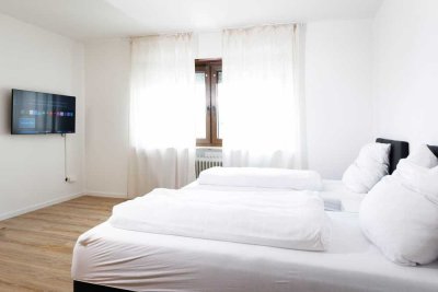 Hochwertiges Komfort-Apartment mit Boxspringbetten, TV & moderner Ausstattung – Wohnen auf Zeit