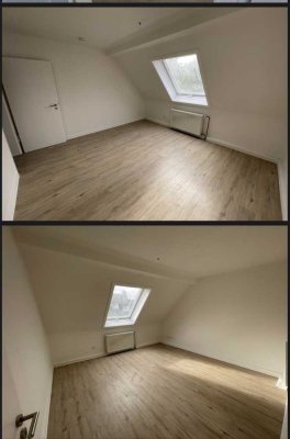 ***Schöne Dachgeschoss mit Laminatböden, Duschbad & Wohnküche mit EBK***