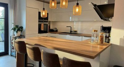 Großzügige, lichtdurchflutete Maisonettewohnung mit zwei Terrassen in begehrter Lage