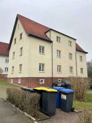Neuwertige 3-Raum-Wohnung mit gehobener Innenausstattung eigenem Garten und Stellplatz