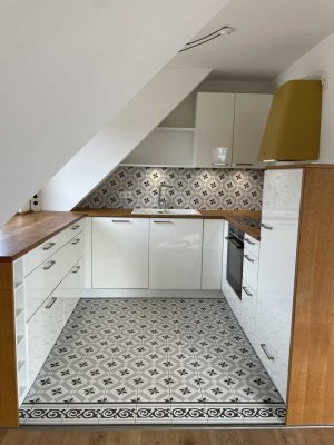 Exklusive und sonnige Dachgeschosswohnung mit extra viel Charme
