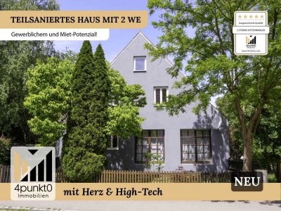 Teilsaniertes Haus mit 2 Wohneinheiten, großem Keller und 9 Stellplätzen.
