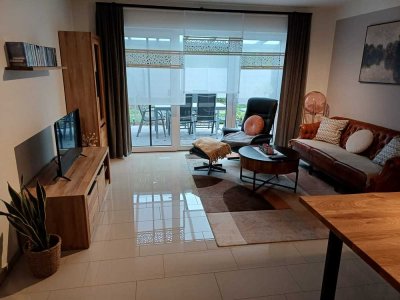 Moderne 3-Zimmerwohnung im EG mit Terrasse und Beet, 85 qm, Garage und Stellplatz