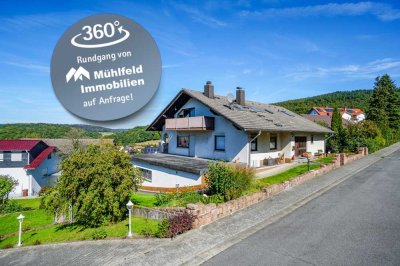 Ansprechendes Anwesen mit drei Wohnungen und vier Garagen!