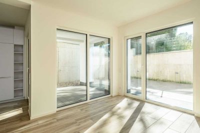 Stylische & lichtdurchflutete Souterrain Wohnung im Neubau-CUBE (ready 2026) mit TOP Preis/Leistung