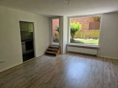 Stilvolle Souterrain-Wohnung – komplett renoviert mit Terrasse! 2-Zimmer-Wohnung in Döse!