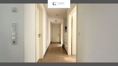Helle Erdgeschosswohnung mit Garten und Garage