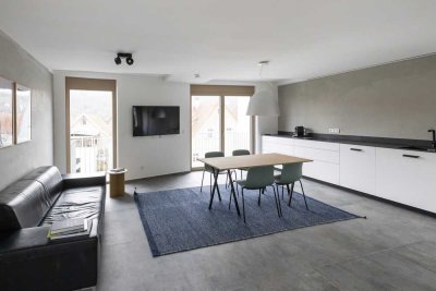 Neubau-Dachgeschosswohnung mit Aussicht – Voll möbliert!