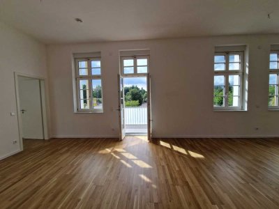 Charmante 3-Zimmer Wohnung mit 
Einbauküche, Balkon, 2 Tiefgaragenplätzen