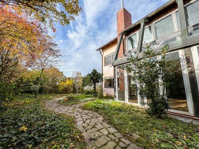 GROßZÜGIGE GARTENWOHNUNG MIT HELLEM SOUTERRAIN