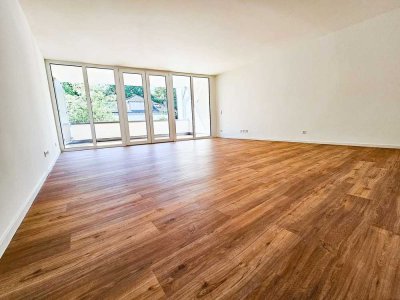 ERSTBEZUG: 4-Zimmer-Neubauwohnung mit hervorragendem Grundriss, neuer Einbauküche und Südbalkon