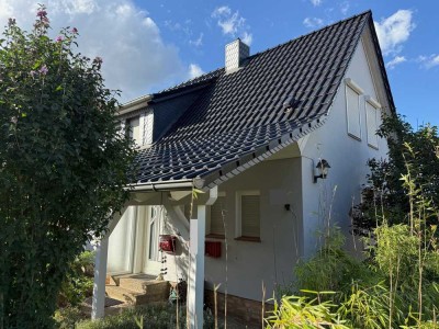 Gemütliche Doppelhaushälfte mit Garage und Gartenteich in Schöningen