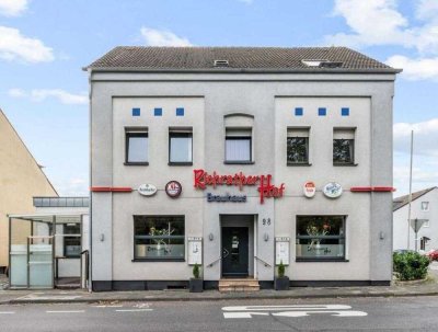 Attraktives Wohn-/und Geschäftshaus mit gut laufender Gastronomie in bevorzugter Lage von Langenfeld