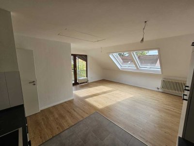 Charmante 2-Zimmer Dachgeschosswohnung mit Balkon in ruhiger Ortsrandlage