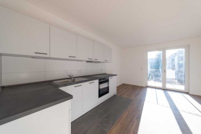 Erstbezug! - 2 Raumwohnung mit Einbauküche und Tiefgaragenstellplatz - WE14