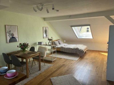 Traumhafte Dachgeschosswohnung in zentraler Lage mit Wohlfühlambiente