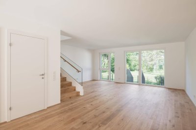 Grün soweit das Auge reicht - Stadtvilla mit kühlem Komfort