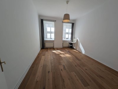 Helle, gut geschnittene Altbau-Eigentumswohnung mit Lift im 7. Bezirk
