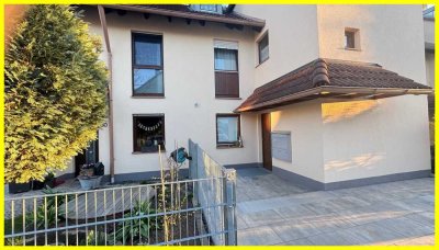 Wohnung im Reihenhausstil mit Garten in begehrter Lage