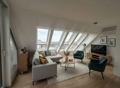 Bis 30.6. noch teilw. Eintragung sparen und Provisionsfrei - Exklusives Penthouse mit Terrasse am Fuße des Küniglbergs.