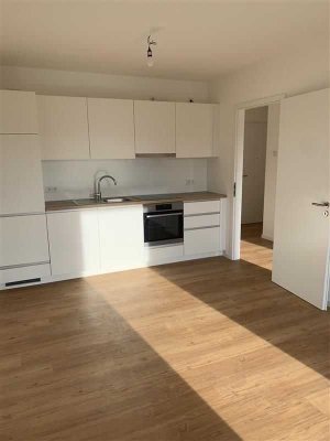 Single-Wohnung mit Terrasse und Einbauküche im Erdgeschoss