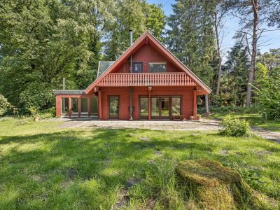 Wohnen am Waldrand - Holzhaus mit Kamin, Wintergarten und großem Naturgrundstück in Elsdorf