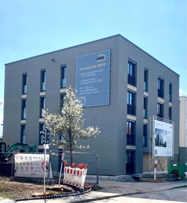 4 Zimmer-Neubauwohnung mit Südterrasse und sonnigem Garten.