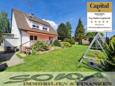 Einfamilienhaus mit viel Potential auf großzügigem Grundstück und 3 Garagen in Petersdorf - Ein O...