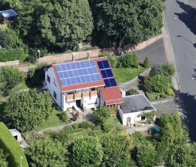 Nachhaltiges Einfamilienhaus mit Gartenidylle, Energieeffizienz & Wohnkomfort pur