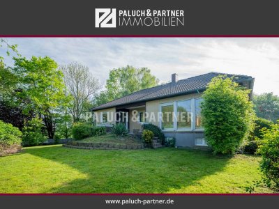 Walmdach-Bungalow mit Filetgrundstück in Braam-Ostwennemar