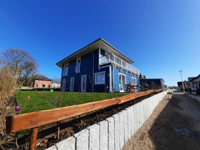 Wohn Dich glücklich – Exklusive 3-Zimmer-Wohnung in Glücksburg in einem Holzhaus