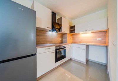 Attraktive 2-RW mit Süd-Balkon * EBK * Bad mit Wanne * abgeschlossener TG-SP * ruhige Lage * TOP *