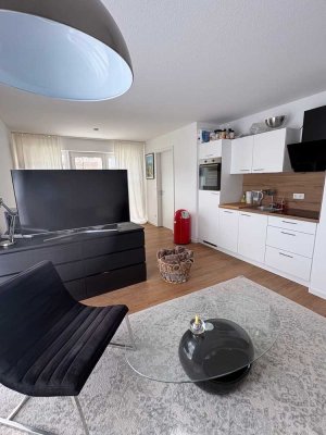 Exklusive 2-Zimmer-Wohnung mit Terrasse inkl. Gartennutzung und TG