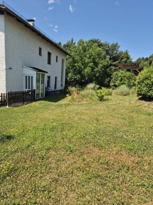 Wohnung mit Garten und Garage
