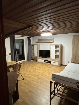 1 - Zimmer Apartment mit Balkon