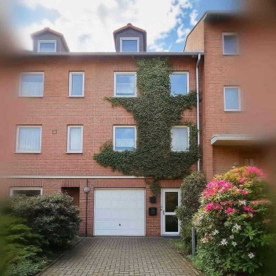 Modernes Reihenmittelhaus mit überdachter Terrasse, Kachelofen und Fußbodenheizung
